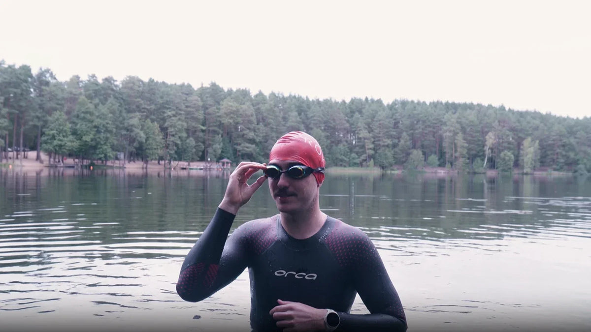 Edgaras adjusting HoloSwim 3 Pro before an open-water swim