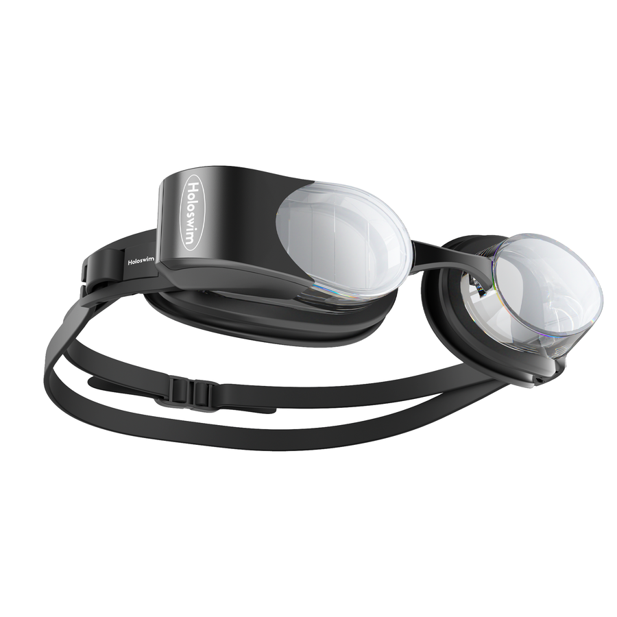 A pair of sleek, modern Holoswim 2 Pro Smart Swim Goggles with clear round lenses, adjustable side straps, and "Holoswim" printed on one side.