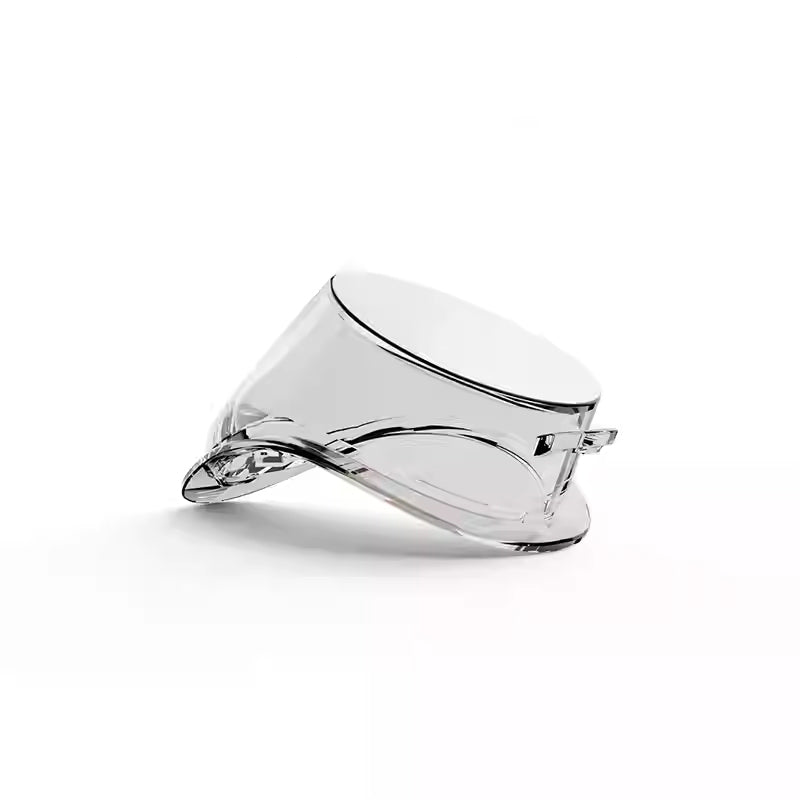 A Replacement Clear Goggle Lens for Holoswim, featuring a wide, curved visor, is shown lying on its side against a plain white background.